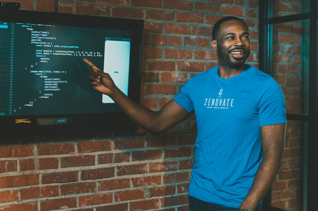 successful programmer smiling