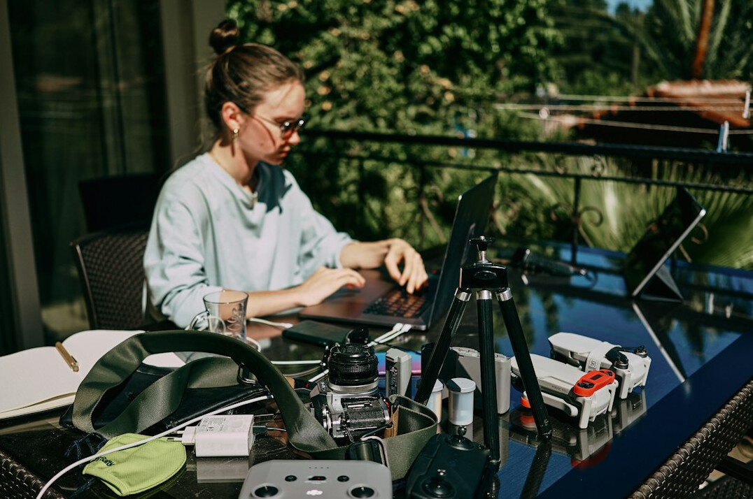 woman coding at home desk